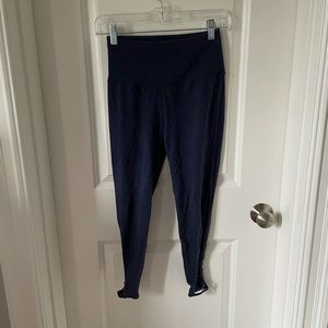Blue Reebok criss-cross leggings. Size XS